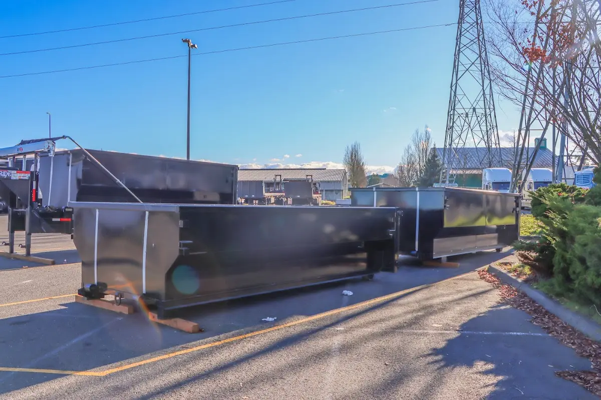 Roll-off dumpster ready for waste disposal at job site for Commercial Dumpster Rental in Holiday